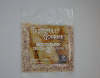 Small clear plastic bag of Tastefully Gourmet Hickory Bacon Cracker Seasoning Mix, 12 servings, no MSG.
