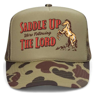 Khaki and camo trucker hat with red text and rearing horse graphic reading "Saddle Up We're Following The Lord"