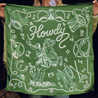 Hunter green satin bandana with white Western cowboy print, featuring "Howdy" script, rearing horse rider, guns, guitar, and 