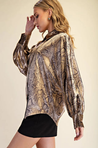 Gold and brown metallic snakeskin print blouse with voluminous long sleeves and button-front collar.