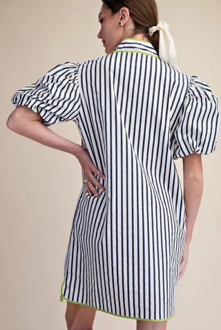 Navy and white striped mini shirt dress with puff sleeves, collar neckline, and lime green trim detailing.
