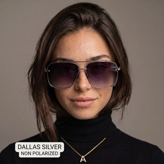 Women's Dallas silver aviator sunglasses with gradient purple lenses and thin metal frame, modeled on brunette woman.