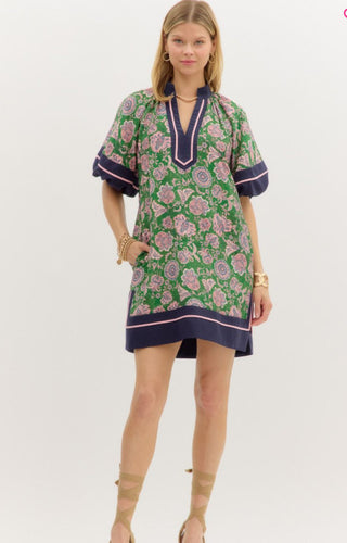 Green and pink floral paisley mini dress with navy trim, bubble sleeves, and V-neckline detail.