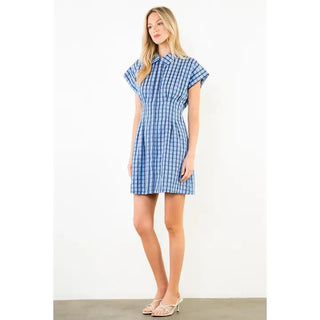 Blue and white checkered short sleeve mini dress with collar, fitted waist, and A-line skirt.